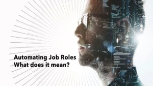 Profile of a man overlaid with digital interface elements, representing artificial intelligence and data-driven processes, with the text 'Automating Job Roles – What does it mean?' on a white radial background.